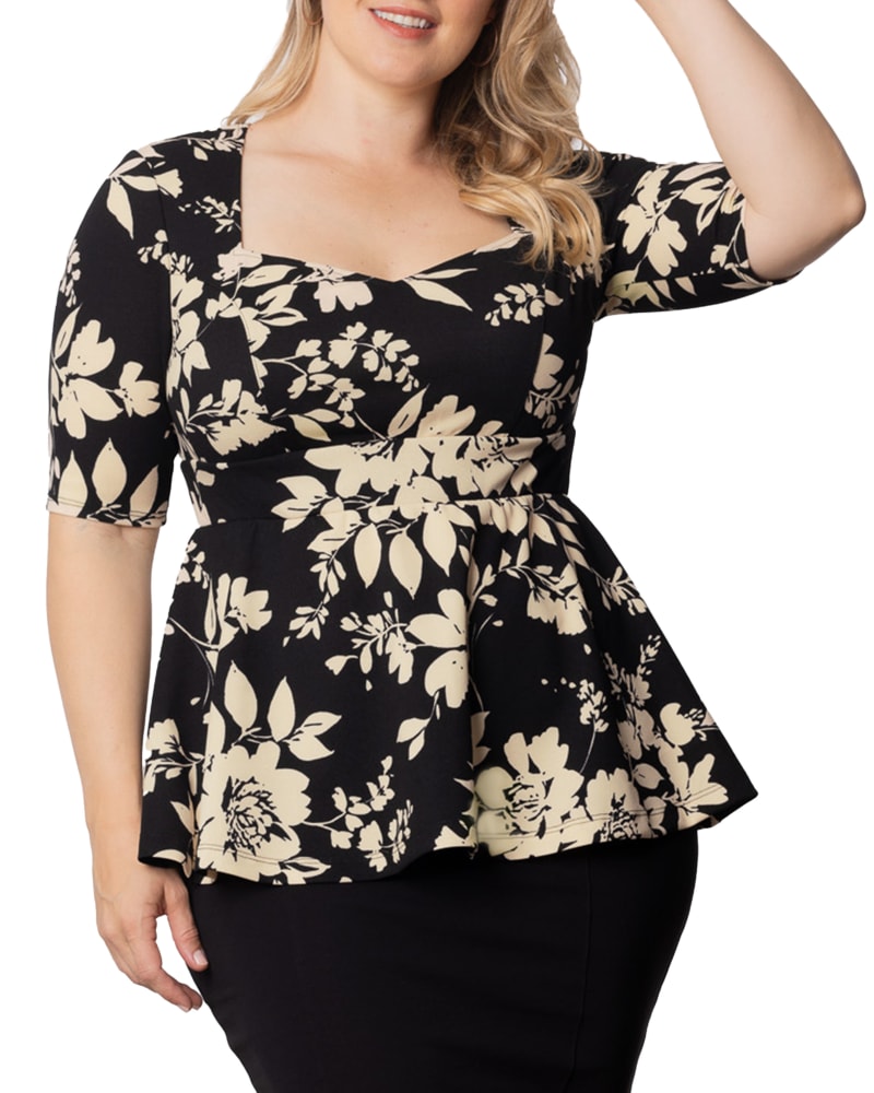 Front of a model wearing a size 0X Posh Peplum Top in VINTAGE IVORY FLORALS by Kiyonna. | dia_product_style_image_id:352960